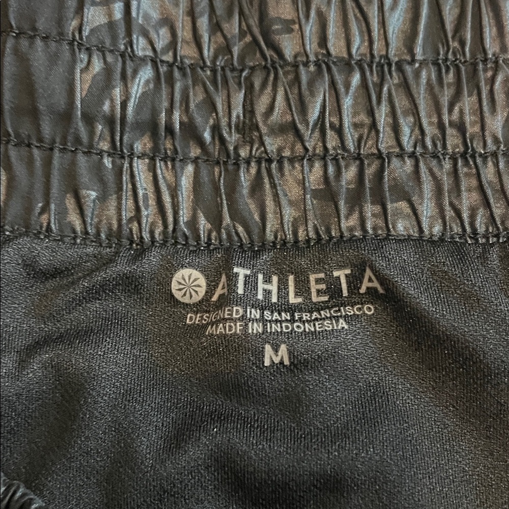 Athleta Shiny Black running shorts